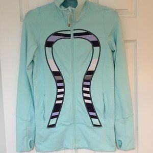 Turquoise Lululemon double-zip athletic wear